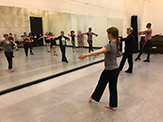 Ellen Sinopoli (center), artistic director for the dance company, teaches a master class at UAlbany.   