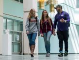 UAlbany students walk through the science library