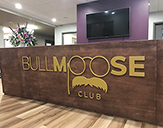 Photo of the front desk at the Bull Moose Club.