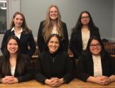 Six women students pose as the team for the plaintiffs 