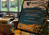 A table-top sign lists the offerings of Calypso's One Love menu