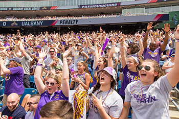 UAlbany fans cheer the Great Danes Lacrosse team at Gilette Stadium during the national semifinals