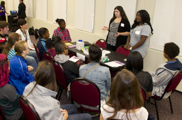 UAlbany GSO Vice President Genevieve Kane (left) and Mary Graham lead a workshop on careers in engineering for Albany High students 