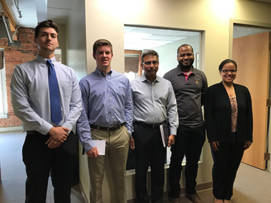 Group photo of the Nowigence team (five people)