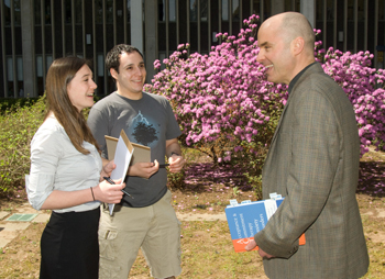 Clinical psychology students Andrea Hobkirk and Ari Rabkin with Associate Professor John Forsyth.