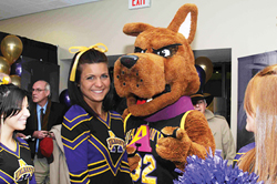 UAlbany cheerleader and Great Dane mascot.