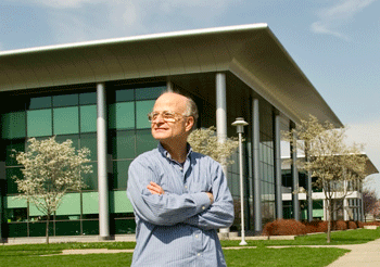 Professor Paul F. Agris standing in front of the Life Sciences Research Building