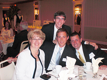 From left, Linda Krzykowski, Mark Adams, James McGaughan, and Andy Cuthbert (standing).
