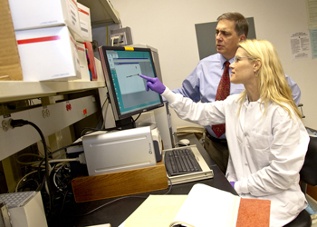 James Dias and doctoral student Kerri Kluetzman