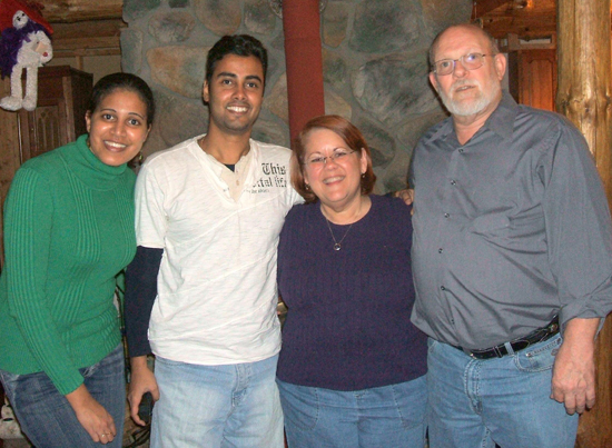 UAlbany students Dhanushki Samaranayake and Chinthaka Jayawardena with staff member Jennifer Watson and her husband