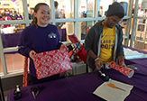 L-LC Students Wrapping Gifts