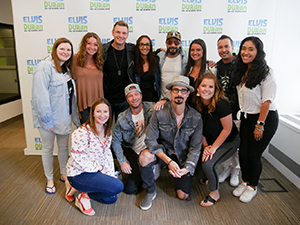 Kitty Modell-Rosen takes a photo with the Backstreet Boys.