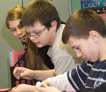 Nicole Spencer working with children at the Boys and Girls Club of Southern Rensselaer County this past semester.