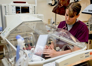 Nurse with premature baby