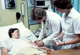 Doctor and nurse with patient