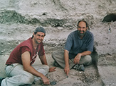 Robert Rosenswig takes photo during archaeological excavation in Belize.