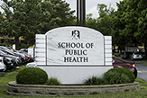 Exterior shot of the School of Public Health sign on the Health Science campus.