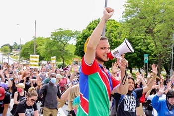 Omar van Reenen leads students during a Black Lives Matter demonstration on the SUNY Oswego campus.
