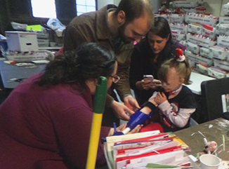 Safyre Terry tries on her new prosthetic hand
