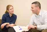Doctoral Students talk together at the Psychological Services Center.