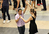 Amaury Muñoz ’13 dancing at a cultural event in China.