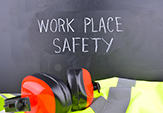 The words Work Place Safety written on a blackboard