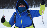 Anthropology professor Cara Ocobock ice fishing above the actic circle in Finland.