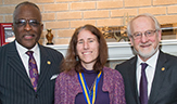 Professor Julie Novkov, pictured with President Robert Jones and Provost James Stellar, won a 2014-2015 Chancellor's Excellence Award. Photo by Mark Schmidt.