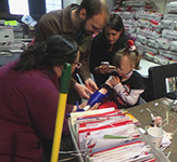 Safyre Terry tries on her new prosthetic hand from UAlbany
