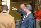 John Giarrusso leads a tour of the Schuyler Building Dec. 7, 2016. (Photo by Mark Schmidt)