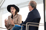 Joyce Carol Oates gesticulates as she speaks at UAlbany BookFest