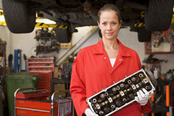 Woman studying to be a mechanic