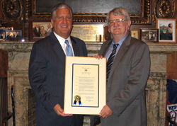 Albany Mayor Gerald D. Jennings honored UAlbany professor Michael R. Werner. 