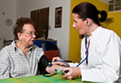 Nurse tending to patient