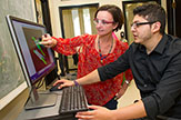 Associate professor Annalisa Scimemi with a student intern.