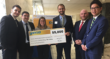 Engineering Students celebrate winning $5,000 for the App to help persons living with disabilities