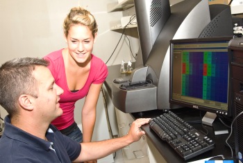 UAlbany Cancer Research Scientist Thomas Begley and student researcher Jessica Hovancik