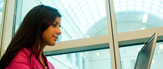 Student at a computer at UAlbany