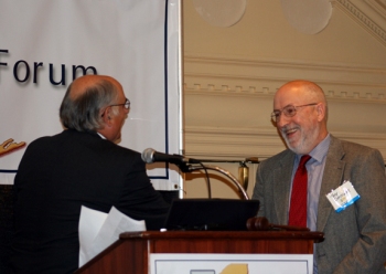 Anthony Cresswell accepts the award from Paul Maguire.