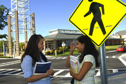 UAlbany students at the Empire Commons crosswalk.