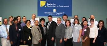 UAlbany President George M. Philip with Center for Technology in Government staff and international faculty