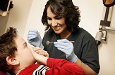 dental hygienist with boy