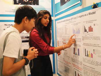 Aneela Gillani answers a question at the conference.