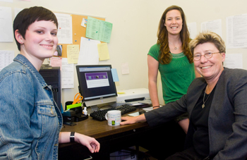 From left , student assistants Sarah Whipple and Lauren Nye, with Writing Center Director Jil Hanifan.