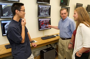 UAlbany student Leon Nguyen, Professor John Molinari, and student Diana Thomas