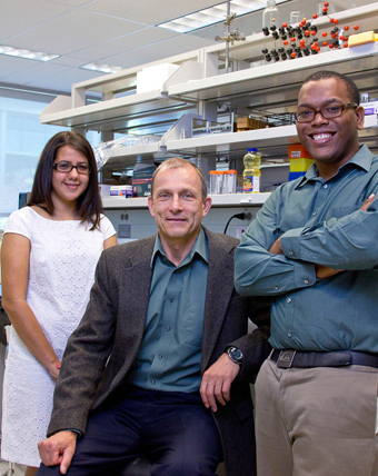 Igor Lednev with doctoral students Manuel F. Rosario-Alomar and Tatiana Quinones