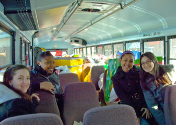 UAlbany students deliver gifts of toys and clothes to more than 200 children at Parsons Child and Family Center.