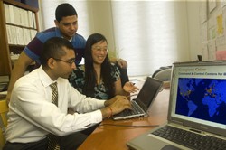 UAlbany associate professor Sanjay Goel with student researchers