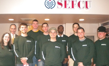 UAlbany students standing in front of campus center SEFCU branch.