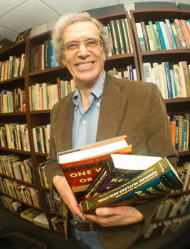 Professor of History Larry Wittner with the three-volume set , The Struggle Against the Bomb.